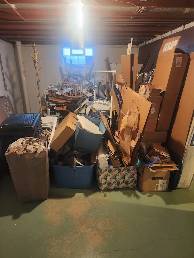 Roll-off dumpster container at job site for 20 Yard Dumpster Rental in Windermere